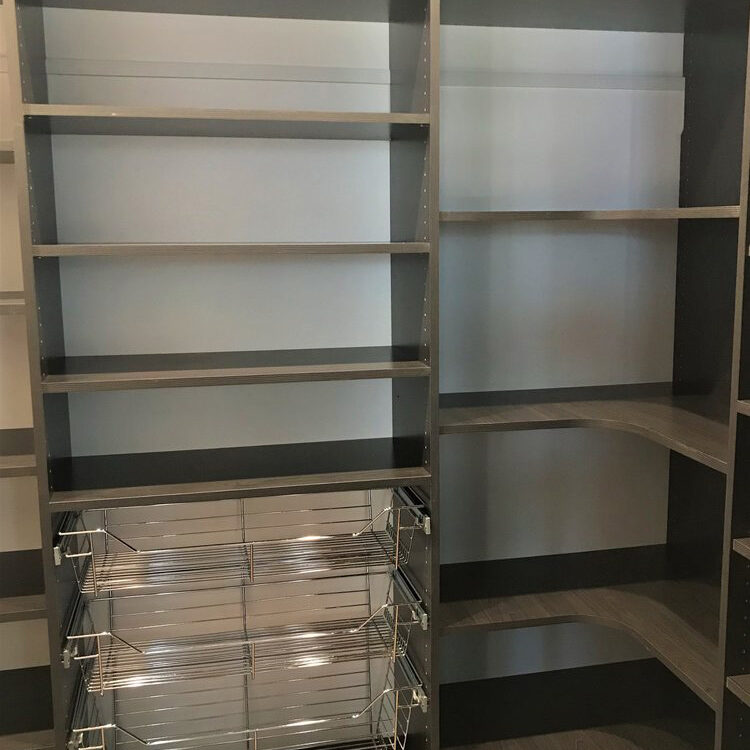 The closet butler custom pantry with grey wood finish.