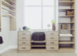 Custom closet featuring warm neutral wood finishes, organized shelves, and stylish hanging spaces for clothing and accessories.