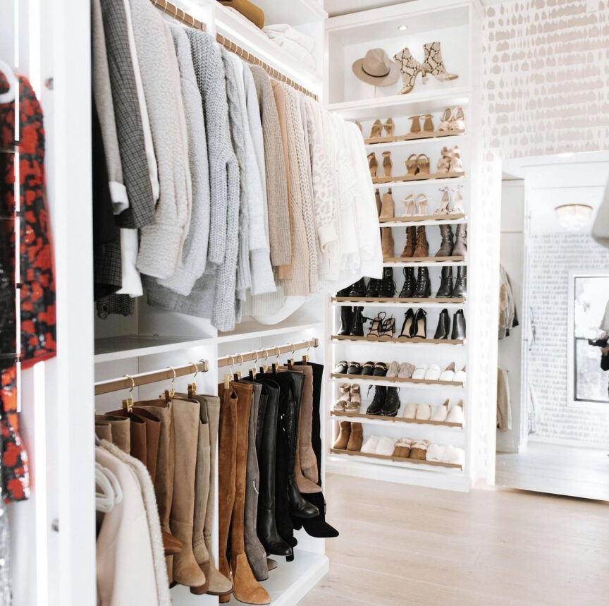 Functional closet layout with strategically planned storage solutions, showcasing a blend of hanging, shelving, and drawer space tailored for optimal organization.
