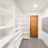 Storage Closet custom designed by the Closet Butler. Explore Winter Orgnization and Custom Cabinet Solutions at Theclosetbutler.com